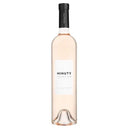 Bottle of Chateau Minuty Prestige Rose 2024 with light pink color and elegant label.